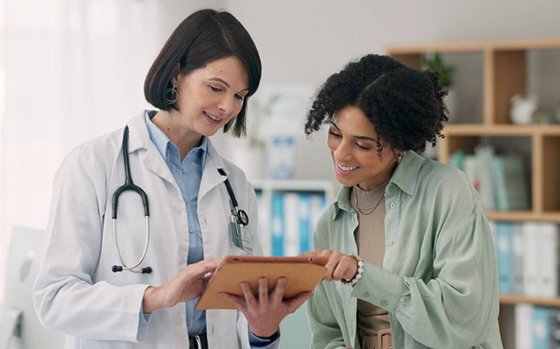 Doctor and patient during holiday dialysis.